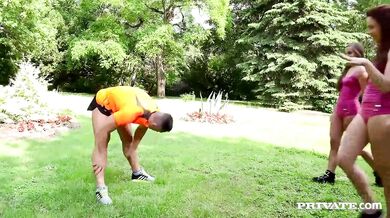 Two teens get a private workout with muscular trainer