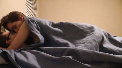 Amateurs half-covered sex in bed