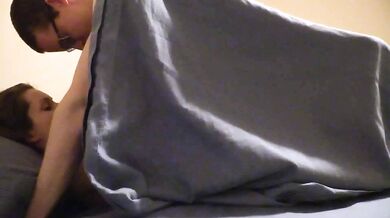 Amateurs half-covered sex in bed