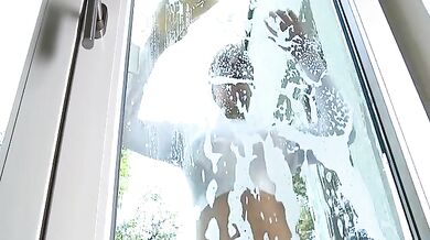 Window cleaning with giant natural boobs