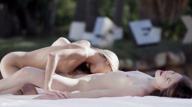 Outdoor lesbian fun between Izzy Delphine and Gina Gerson