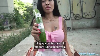 Asian hottie lets him insert a cucumber into her pussy to test her depth