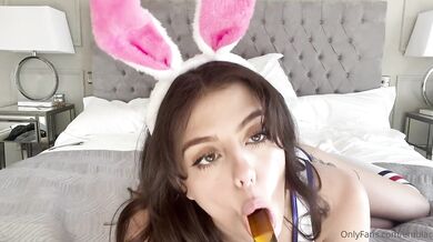 Bunny Emily Black Touching Herself On The Bed
