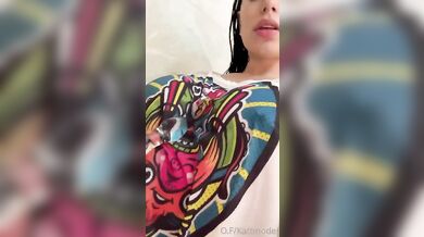 Kattdumont drills her asshole in the shower, her wet shirt clinging to her body