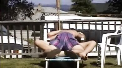 Carla Spreads Her Legs And Flashes Her Pussy While Sunbathing In The Yard