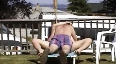 Carla Spreads Her Legs And Flashes Her Pussy While Sunbathing In The Yard
