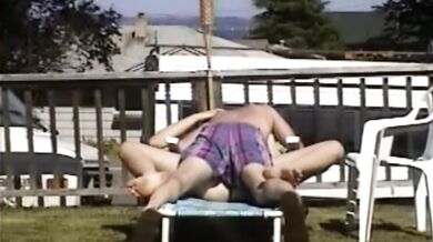 Carla Spreads Her Legs And Flashes Her Pussy While Sunbathing In The Yard