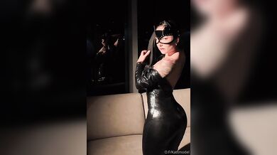 KattModel As Catwoman Fingers Her Asshole