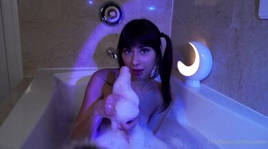 LunaRexx Has Bathtub Fun With Her Hard Dildo