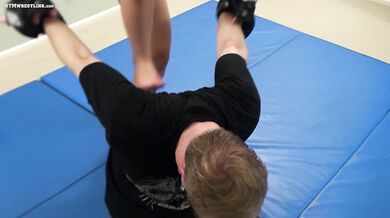 Strong girl wrestles strong dude
