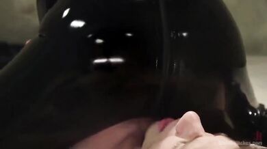 Latex mistress has guy for treatment