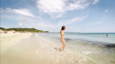 Naked walk on a beautiful beach