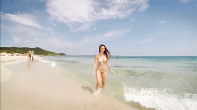 Naked walk on a beautiful beach