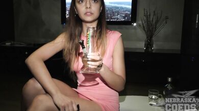 Smoking Brunette Strips And Masturbates With Vodka Bottle