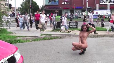 Michaela Isizzu appears naked in public