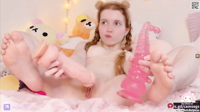 Petite girl masturbates in her pink room