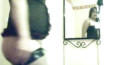 Asian in PVC shows shaved pussy for licking