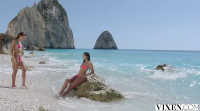 Three pussies fucking in foursome on the beach
